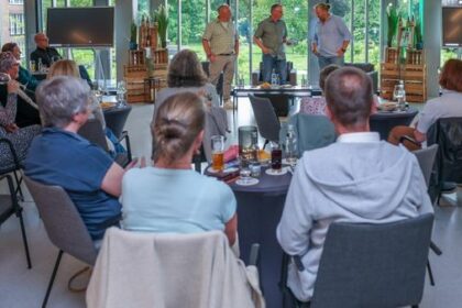 Dinslakener knipste Merkel in der Kabine des Nationalteams