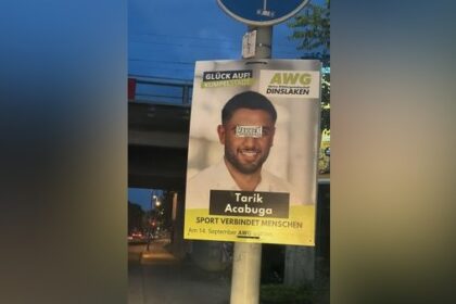 Wahlplakat beklebt: AGW „erschrocken“ - rechter Hintergrund?