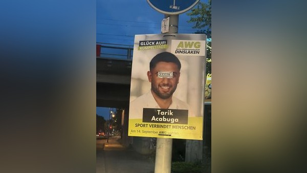 Wahlplakat beklebt: AGW „erschrocken“ - rechter Hintergrund?